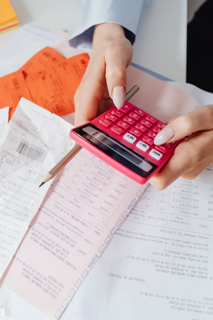 Professional assisting a client with personal tax preparation in Vancouver at PC Tax Solutions Professional assisting a client with personal tax preparation in Vancouver at PC Tax Solutions