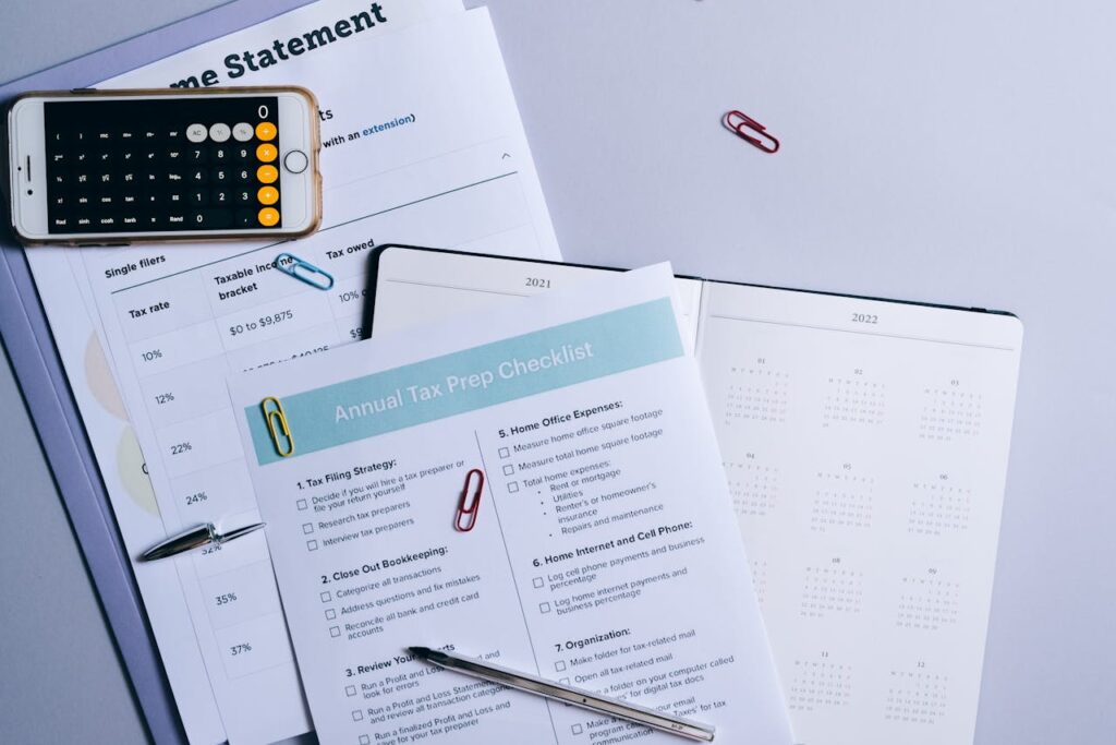 Business tax preparation services Business tax documents and forms neatly arranged on a desk